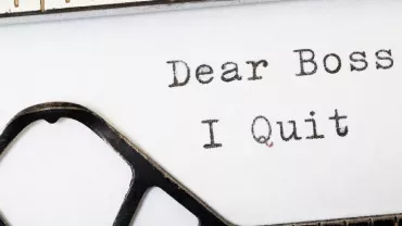 Typewritten message on paper reads: Dear Boss