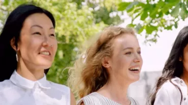 Three women walking outdoors